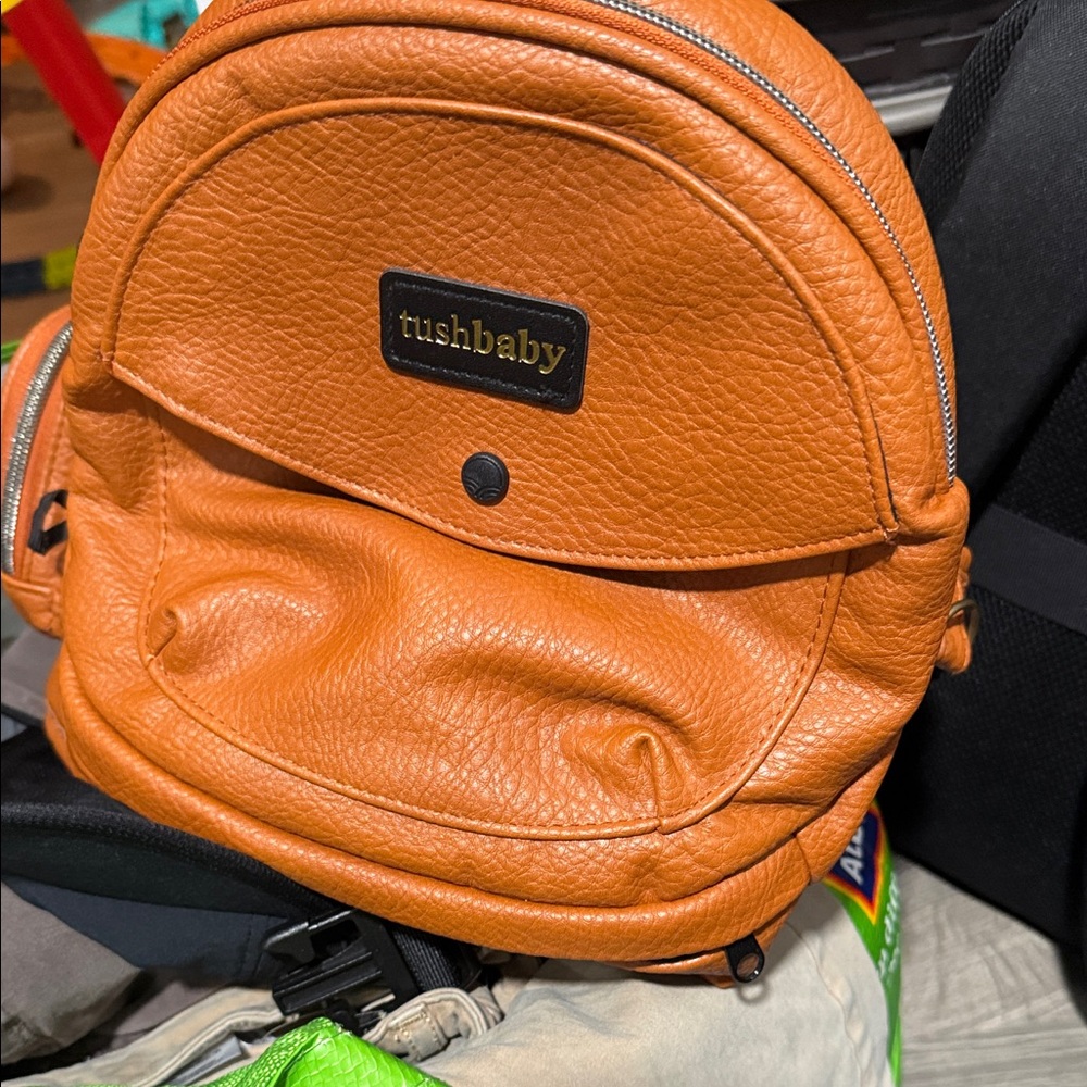 Tushbaby Orange Leather Backpack